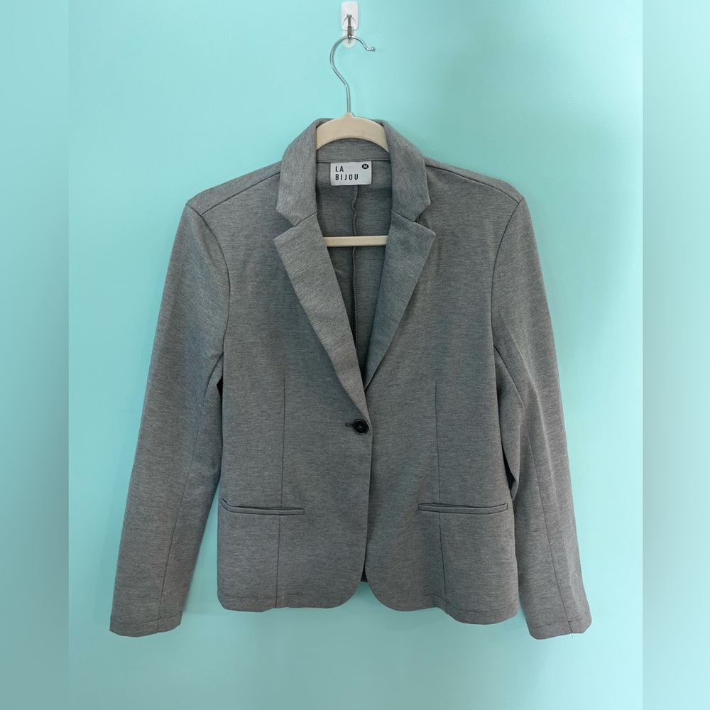 Stylish womens blazer. Size Medium.